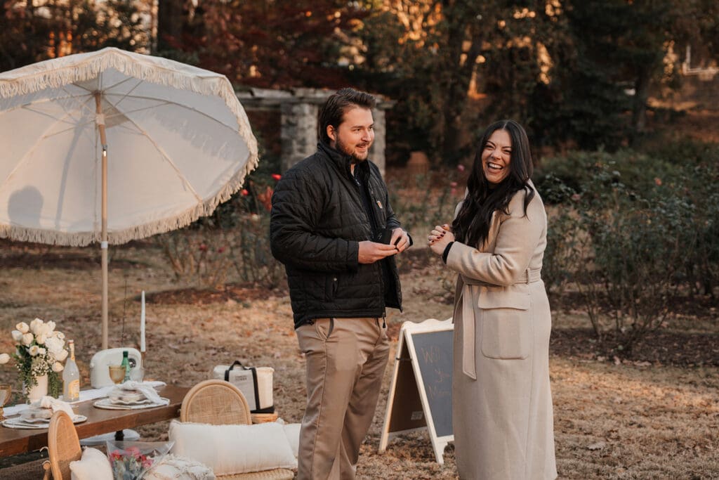 Emotional reaction during Raleigh Rose Garden proposal moment in North Carolina.