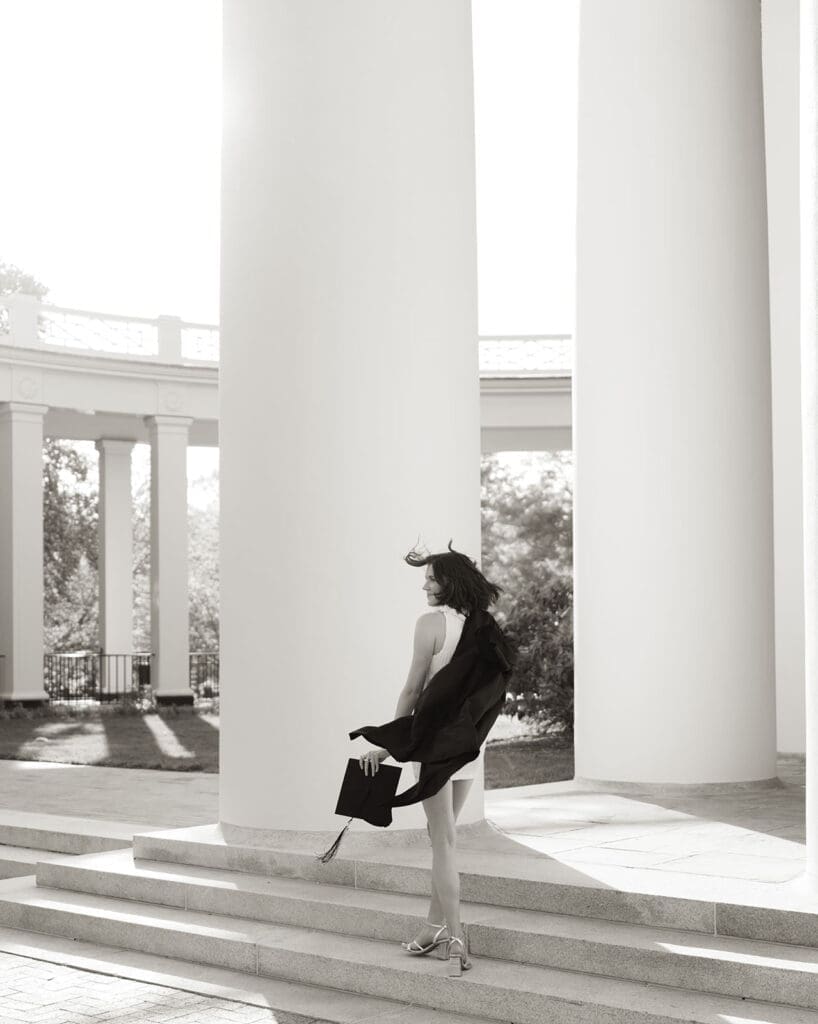 Wake Forest senior portrait framed by the columns of Wait Chapel on campus