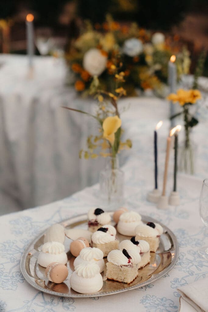 French pastries displayed on an elegant wedding tablescape.