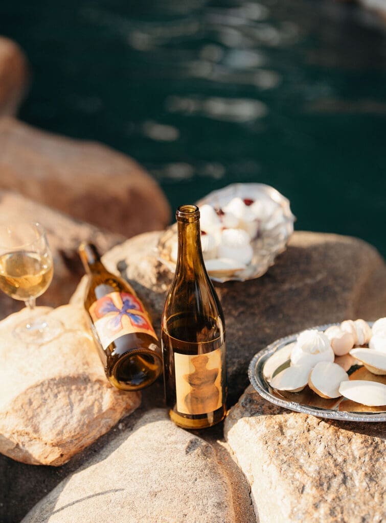 Wine and French pastries displayed for an editorial wedding reception.